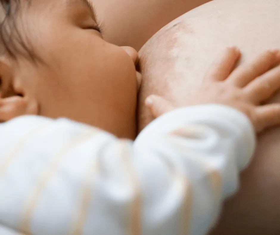 A baby sleeping peacefully, illustrating newborn care.