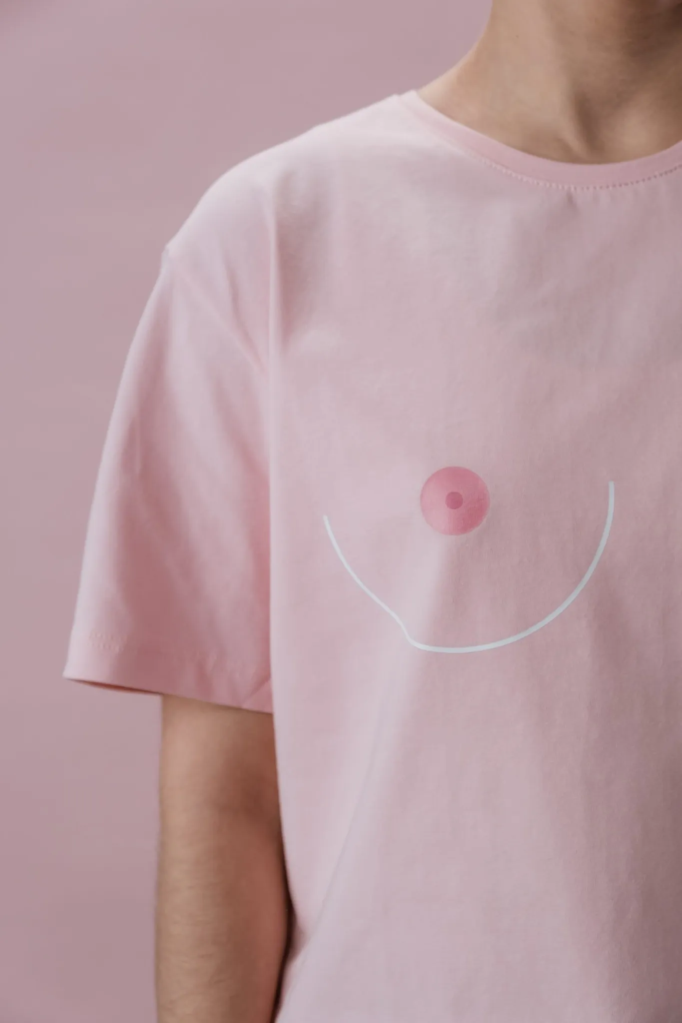 Newborn baby's hand holding an adult's finger