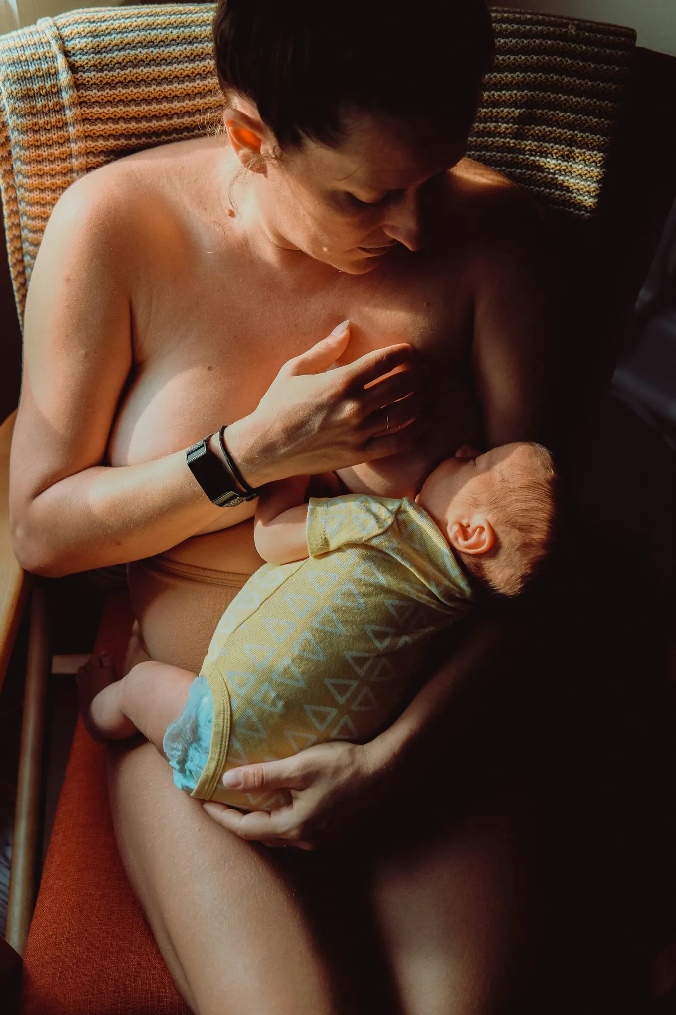 A baby sleeping peacefully, illustrating newborn care.